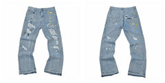 Gallery Dept Multi‑Mark Distressed Paint Jeans