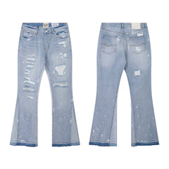 Gallery Dept Light‑Wash Ripped Paint‑Speck Flare Jeans