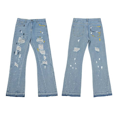 Gallery Dept Multi‑Ripped Paint‑Speck Flare Jeans