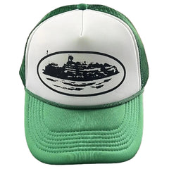 Corteiz Vintage Green and White Trucker Hat with Oval Cruise Ship Graphic